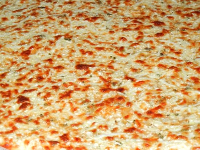 a close-up of cooked cauliflower crust